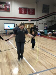 Nurse Demonstrating how jump rope is done