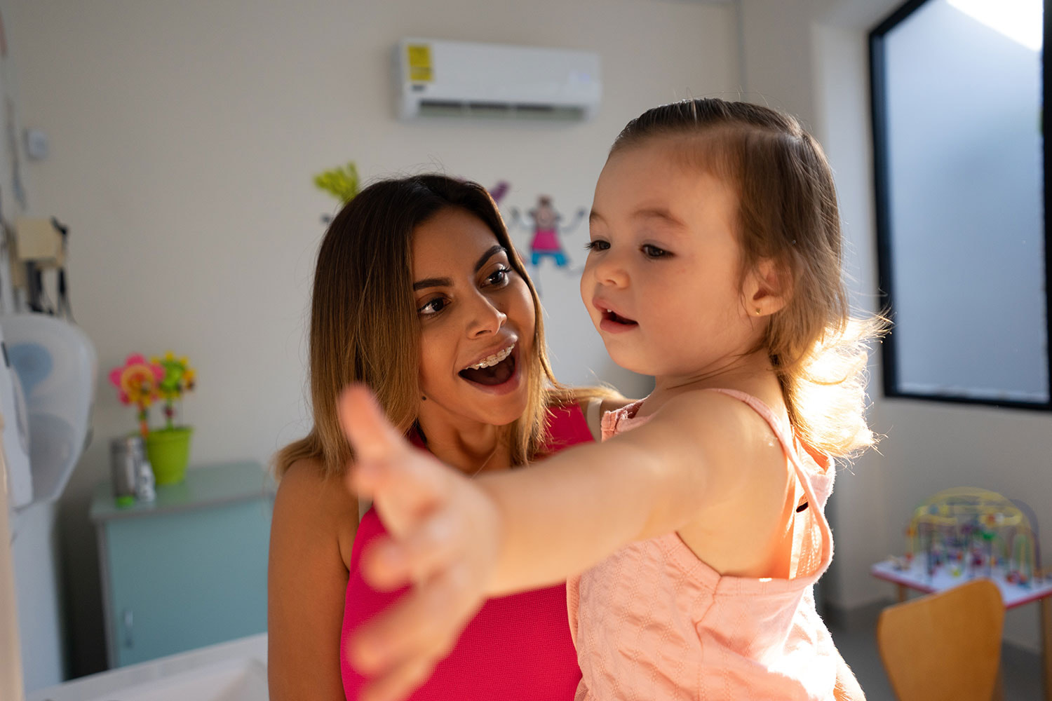 Mother & Daughter in doctor office